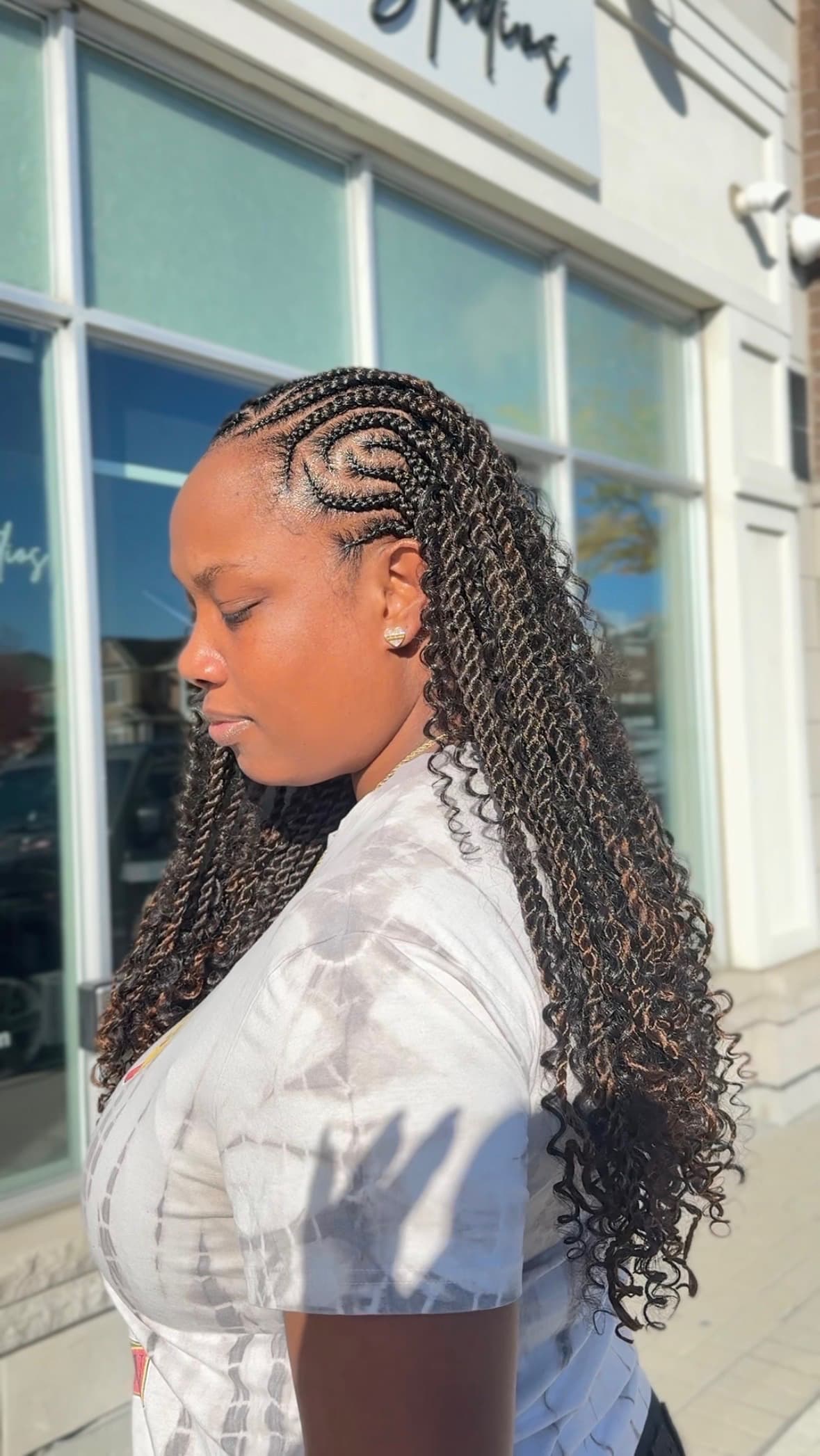 A BGR Hair Studios professional working with a client