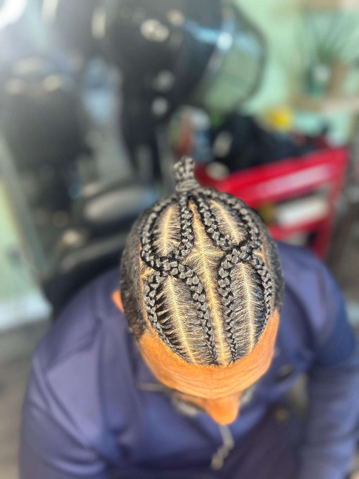 Detailed braid parting and styling by BGR Hair Studios